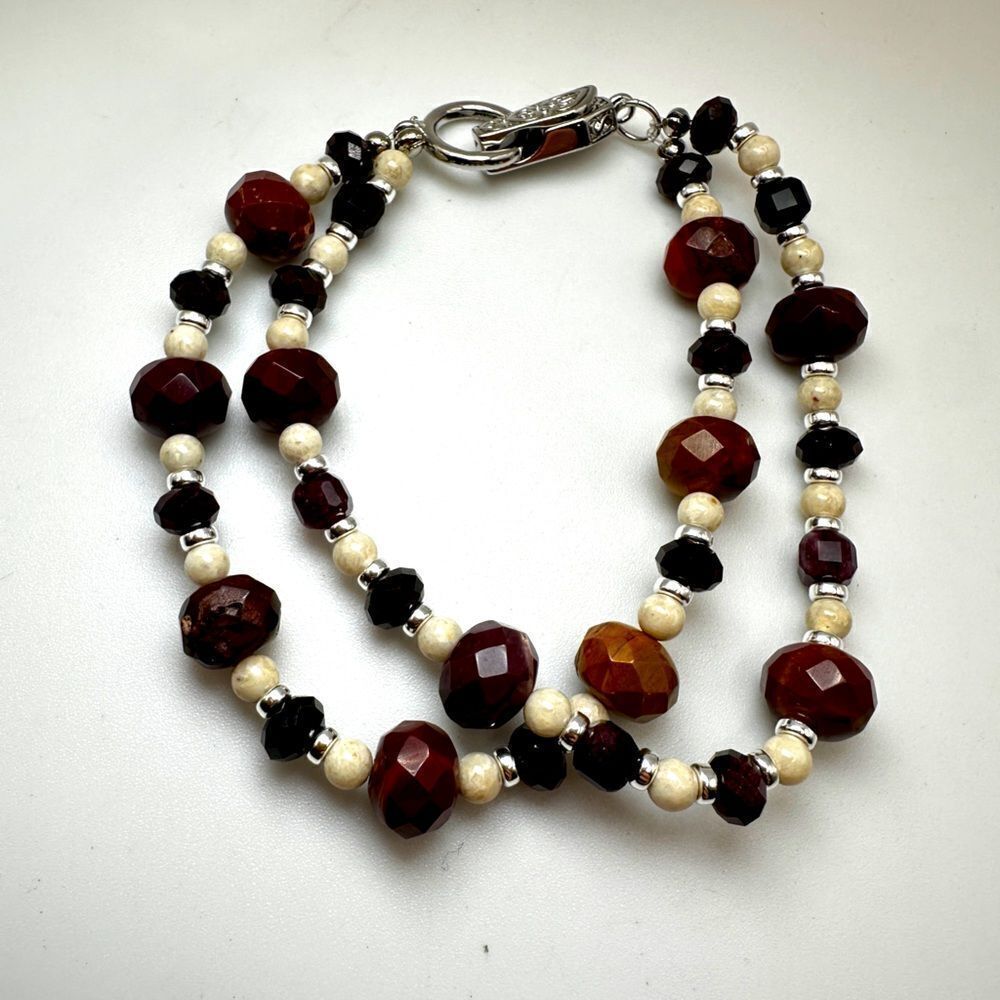 Stunning double stranded faceted garnet, mookaite, and agate bracelet!